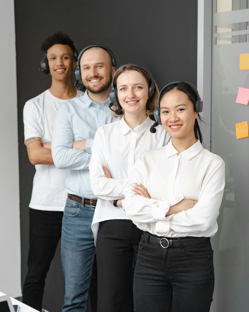 a group of smiling customer service virtual assistants